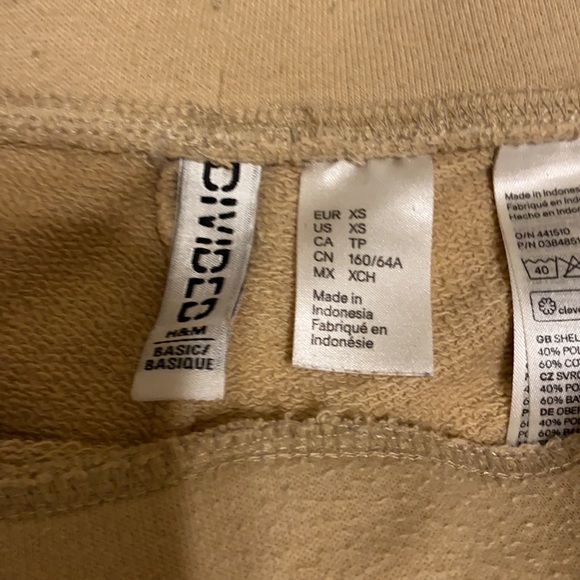 Tan athletic shorts with white - Picture 2 of 2